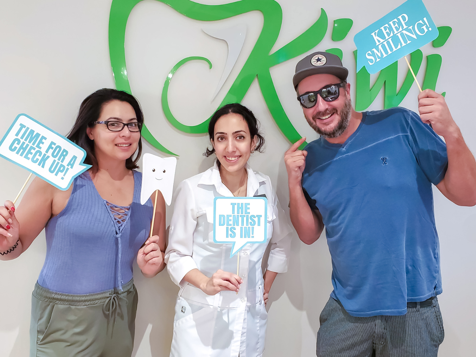 Dr Nourian with patients at Kiwi Dental office
