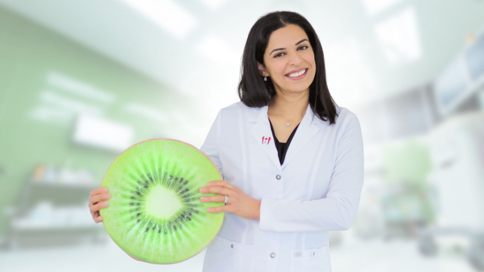 Dr. Zainab Baghdadi professional shot with kiwi